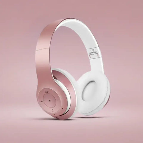 Auriculares Bluetooth gaming en color rosa dorado y blanco, ideales para PC y consola