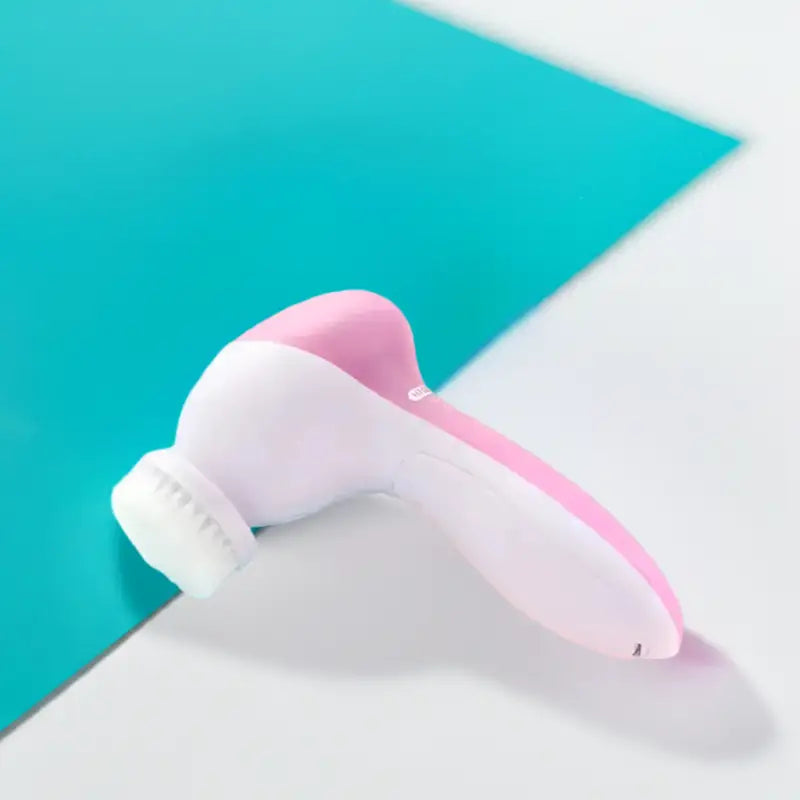 Limpiador eléctrico facial rosa y blanco para una limpieza facial efectiva y electrónica