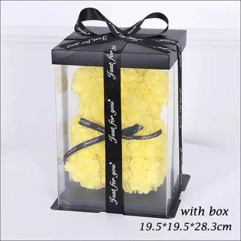 Oso de rosas amarillo en caja transparente ideal para San Valentín y aplicaciones decorativas