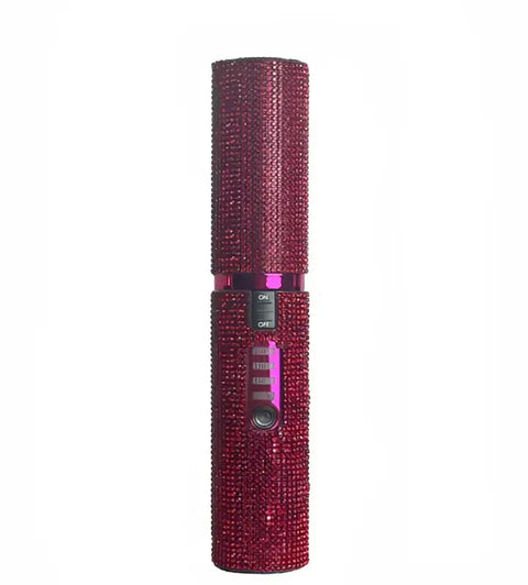 Dispositivo de seguridad personal cilíndrico rosa oscuro cubierto de cristales para tu cabello