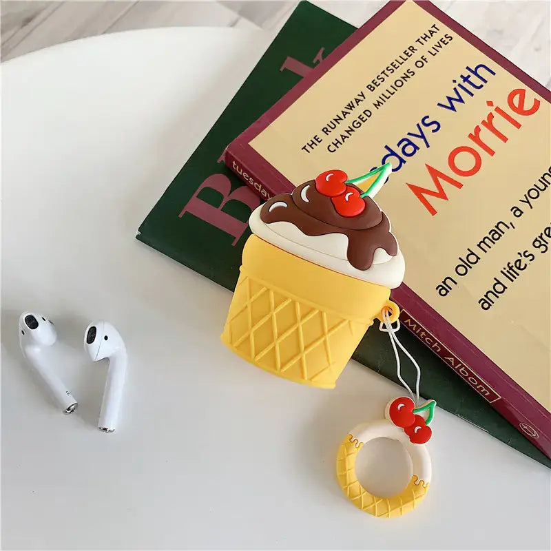Funda de auriculares Bluetooth en forma de helado de fresa, perfecta para electronica y audio