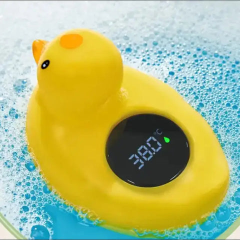 Termómetro pato amarillo con pantalla digital, dentro del agua