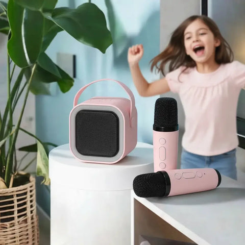 Altavoz Bluetooth portátil rosa con micrófono inalámbrico