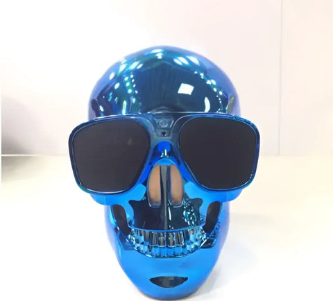 Altavoz Bluetooth de calavera azul metálica con gafas de aviador