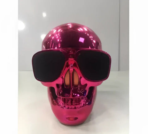 Altavoz Bluetooth calavera rosa metálico Edifier con gafas de sol