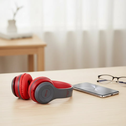 Auriculares Bluetooth de diadema inalámbricos rojos y grises con diseño elegante en audio