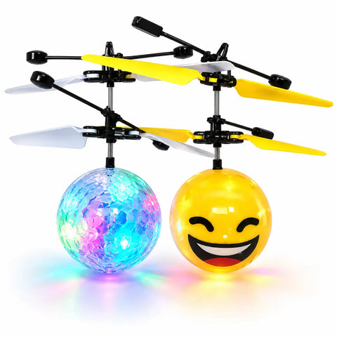 Bola voladora led con luces led y diseño de emoji amarillo sonriendo suspendido con hélices de helicóptero negro