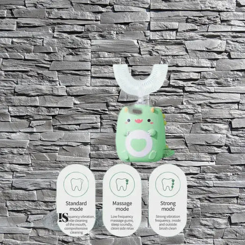 Cepillo de dientes eléctrico para niños en forma de dinosaurio verde con tres modos de limpieza