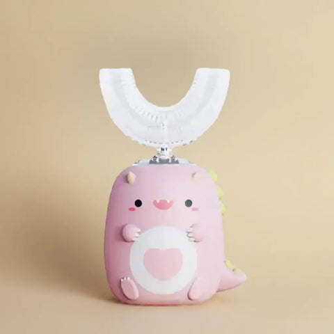 Cepillo de dientes eléctrico para niños en forma de dinosaurio rosa con cabezal en forma de U