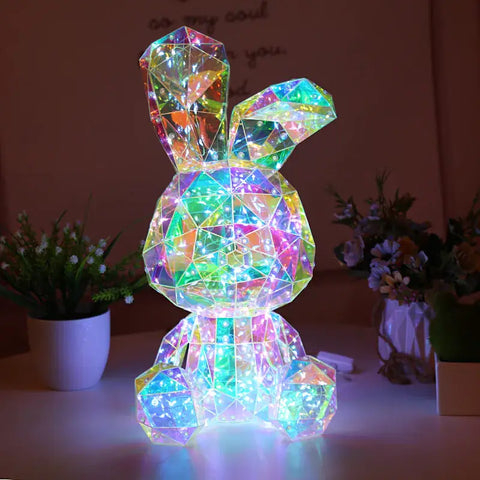 Adorno encantador Conejo de fantasía con luz geométrica e iridiscente