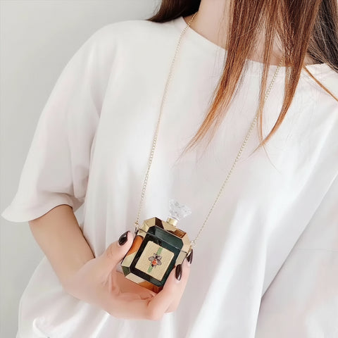 Funda AirPods estilo perfume con frasco geométrico dorado