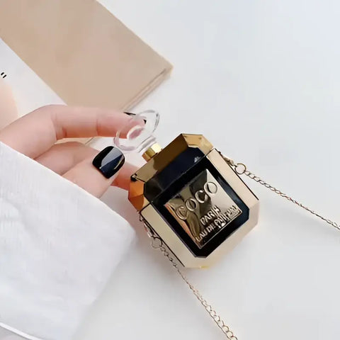 Estuche de botella de perfume dorado y negro para AirPods de Apple