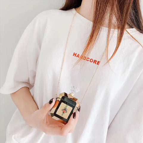 Estuche perfume botella dorado y negro con patrón geométrico para Apple AirPods