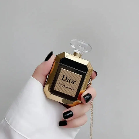 Funda AirPods estilo perfume con frasco Dior dorado y negro