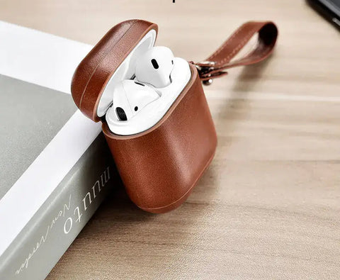 Funda de cuero ICARER para AirPods de alta calidad con correa de muñeca
