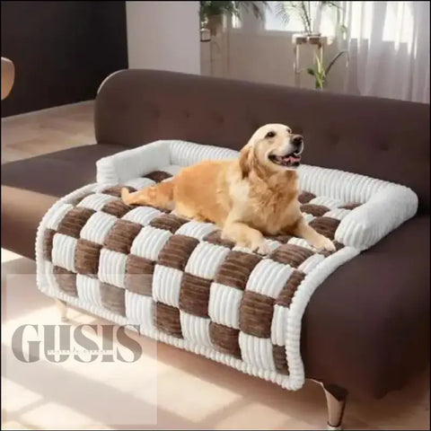 Couch cover Antimanchas para mascotas en check marrón y blanco con un Golden Retriever