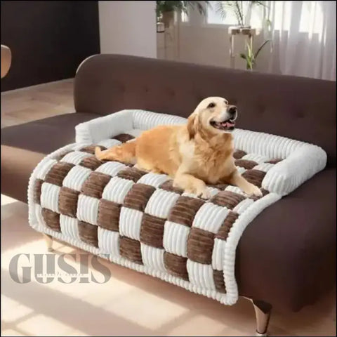 Couch cover Antimanchas para mascotas en check marrón y blanco con un Golden Retriever