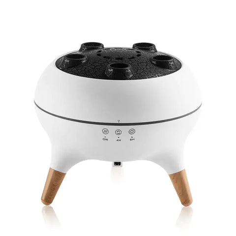 Difusor de aroma ultrasónico blanco y negro con patas de madera, ideal para electronica y iluminación