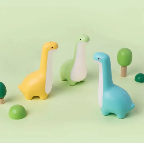 tres luces de dinosaurio amarillo verde y azul