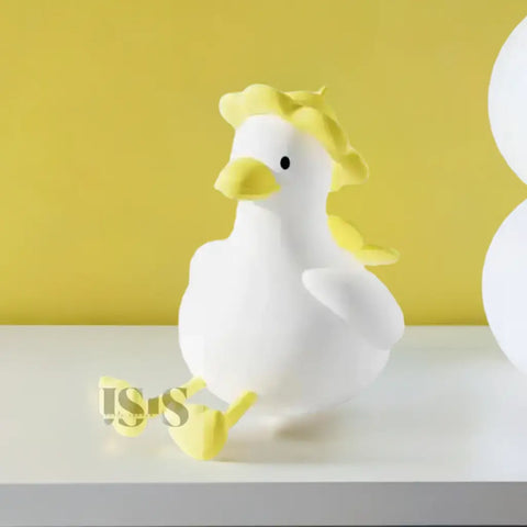 Lámpara de noche en forma de pato blanco con acentos amarillos, envío gratis
