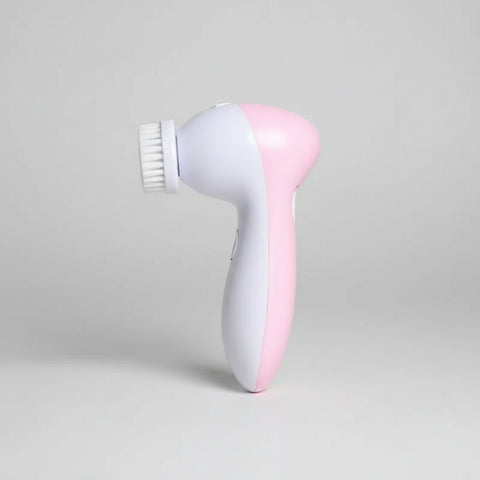 “Limpiador facial eléctrico 5 en 1 rosa y blanco de perfil sobre fondo gris claro.”