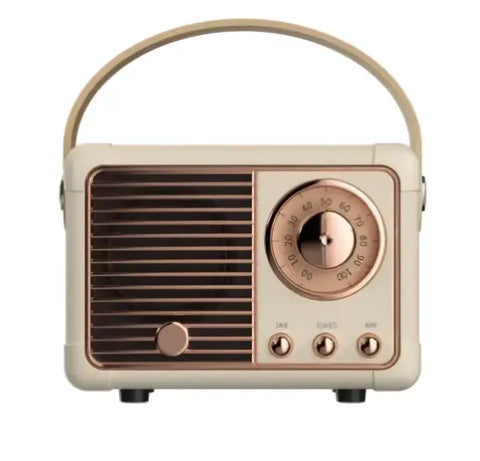 Mini altavoz bluetooth portátil retro color crema con dial y asa en tono oro rosa usb y tarjeta de memoria