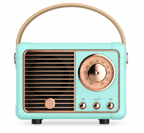 Mini altavoz bluetooth retro portátil color verde menta con acentos en oro rosa y asa de madera compatible con usb y tarjeta de memoria