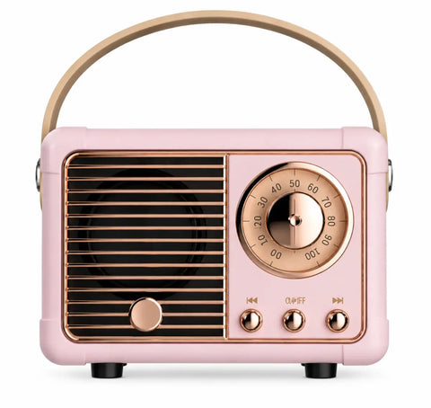 Mini altavoz bluetooth portátil retro rosa con detalles en oro rosa y asa curva compatible con usb y tarjeta de memoria