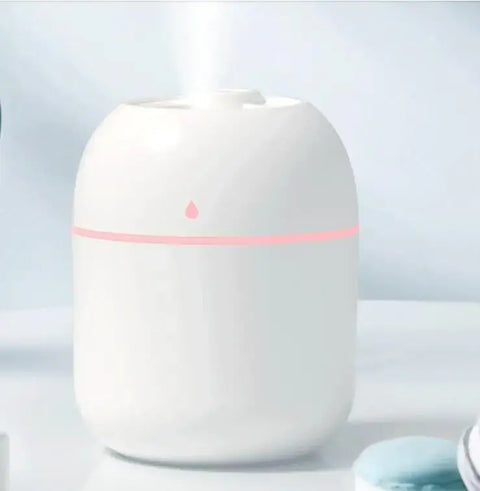 humidificador blanco ñuz rosa emisor de vapor.