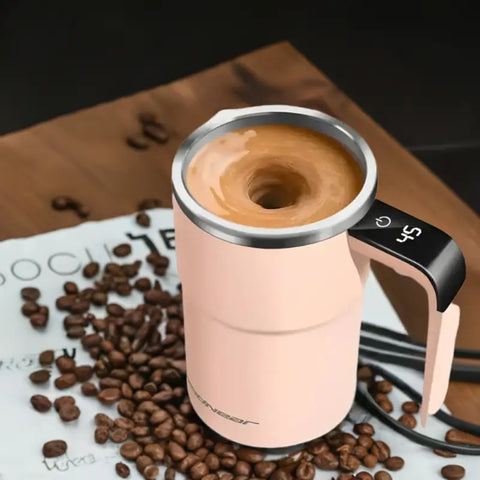Taza eléctrica rosa para mezclar bebidas de forma automática y eficiente